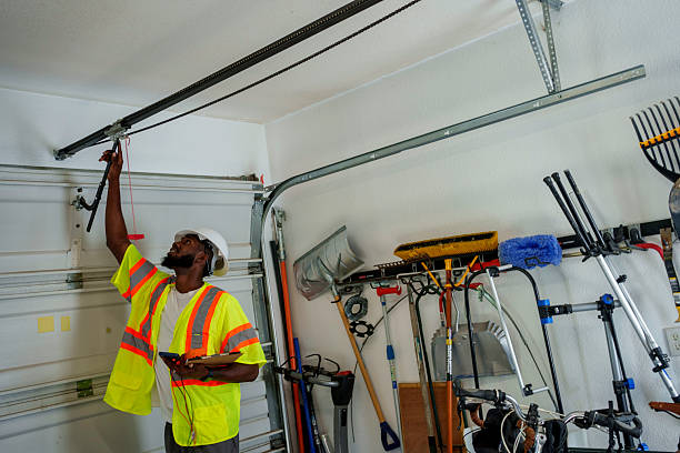 Professional Garage Door Panel Replacement technician working in Meridian Village, CO